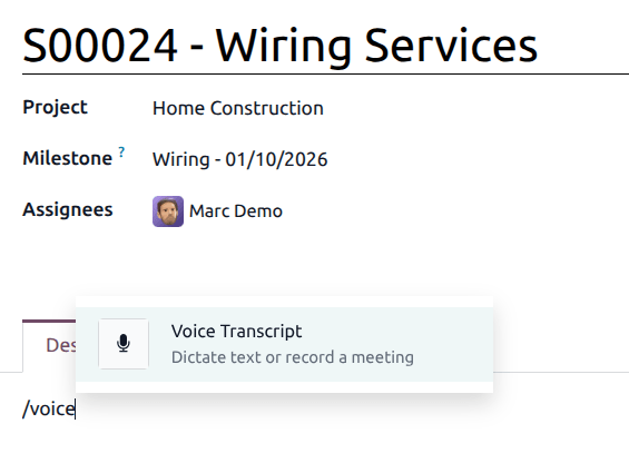 The powerbox in the description tab of a task in the Projects app.